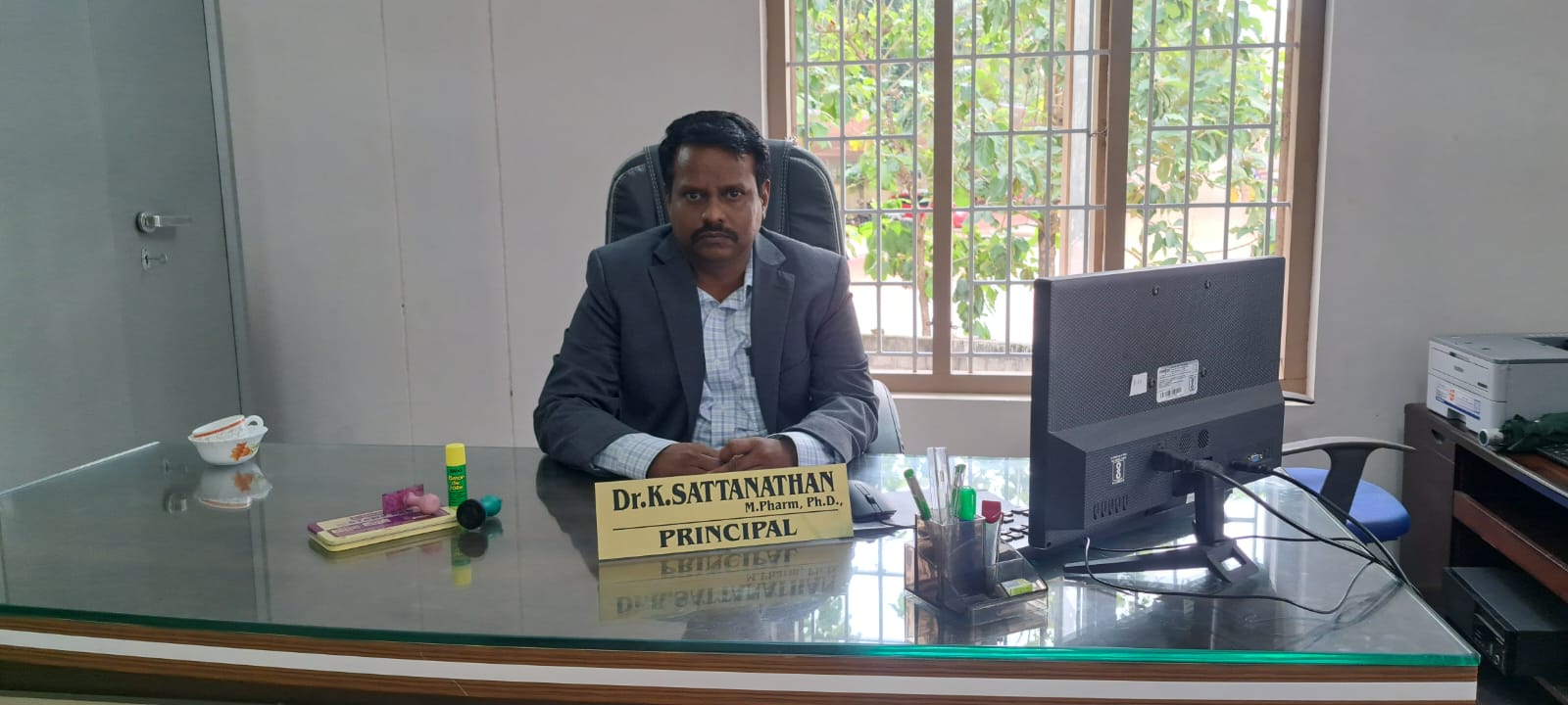 Dr. K. Sattanathan at the office